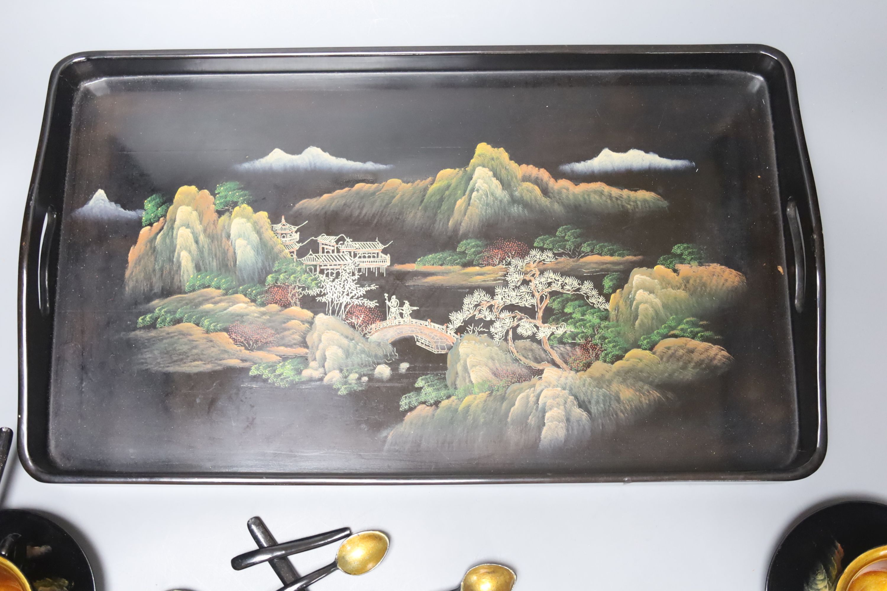 A Chinese papier mache teaset on tray